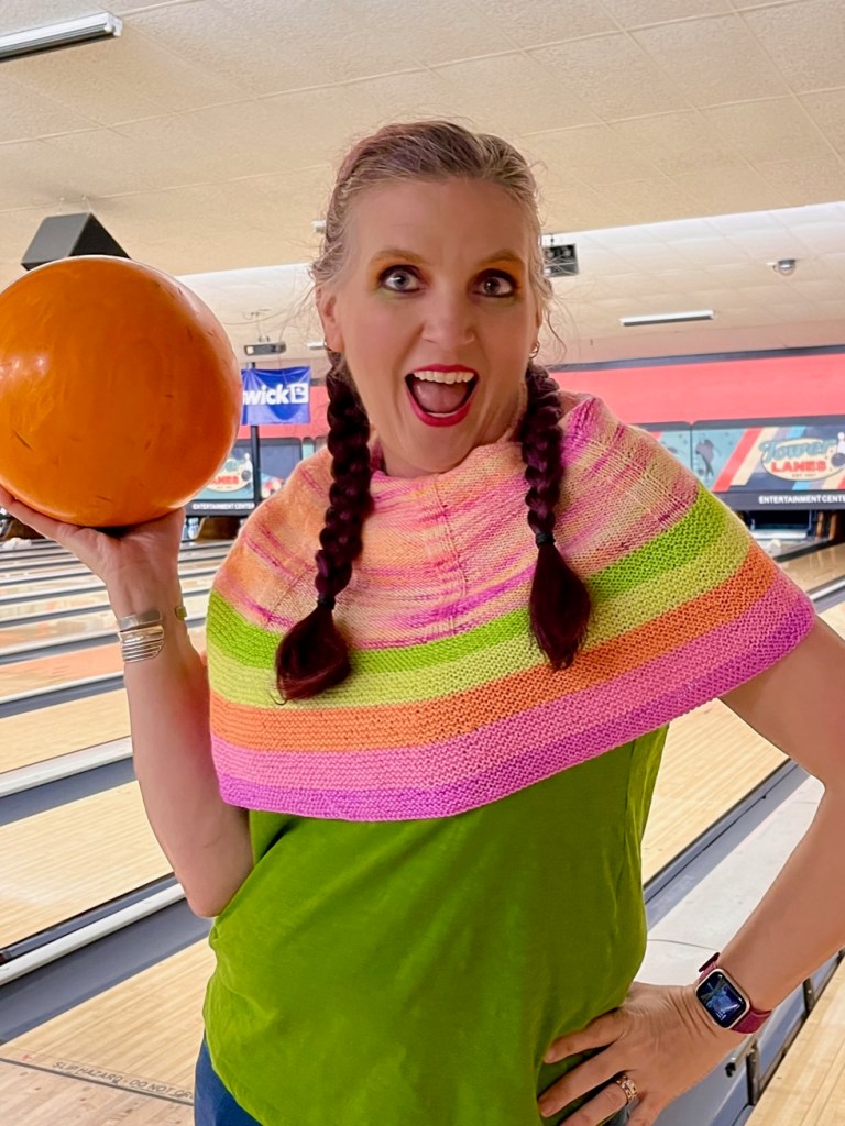 Kelly holding a bowling ball